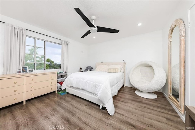 13750 Hubbard St Unit 77, Sylmar, CA 91342 - bedroom with wood finished floors, a ceiling fan, and recessed lighting
