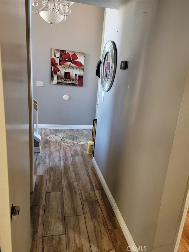 36901 33rd St E, Palmdale, CA 93550 - hall with dark wood-type flooring and a chandelier