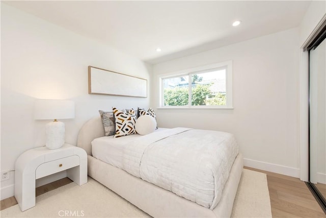 19281 Sierra Inez Rd, Irvine, CA 92603 - bedroom with light wood finished floors and recessed lighting