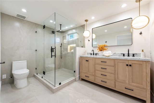 19281 Sierra Inez Rd, Irvine, CA 92603 - bathroom featuring a shower stall, double vanity, and recessed lighting
