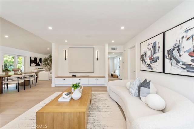19281 Sierra Inez Rd, Irvine, CA 92603 - living room featuring light wood-type flooring and recessed lighting