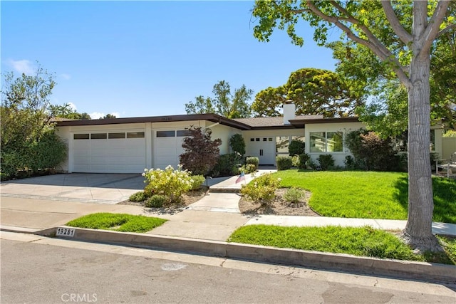 19281 Sierra Inez Rd, Irvine, CA 92603 - view of front of property with an attached garage, driveway, a chimney, a front lawn, and stucco siding