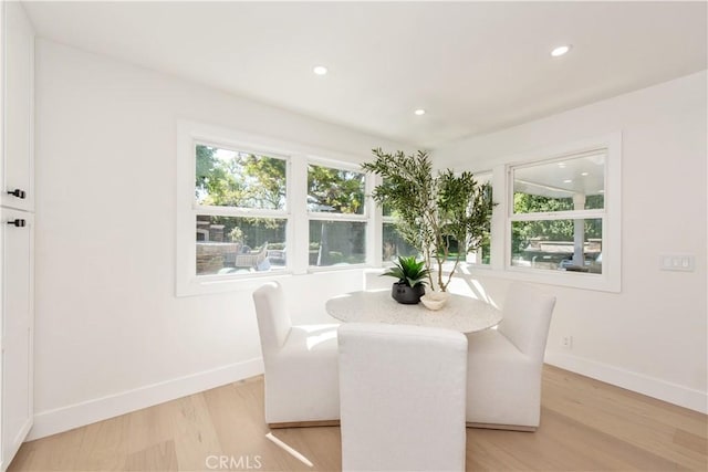 19281 Sierra Inez Rd, Irvine, CA 92603 - dining room with light wood finished floors and recessed lighting