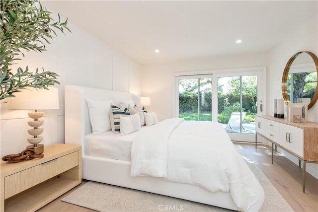 19281 Sierra Inez Rd, Irvine, CA 92603 - bedroom featuring light wood-style floors, access to outside, multiple windows, and recessed lighting