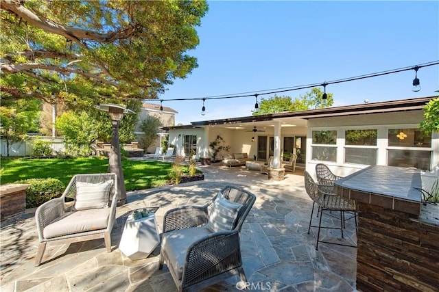 19281 Sierra Inez Rd, Irvine, CA 92603 - view of patio with outdoor lounge area and a ceiling fan