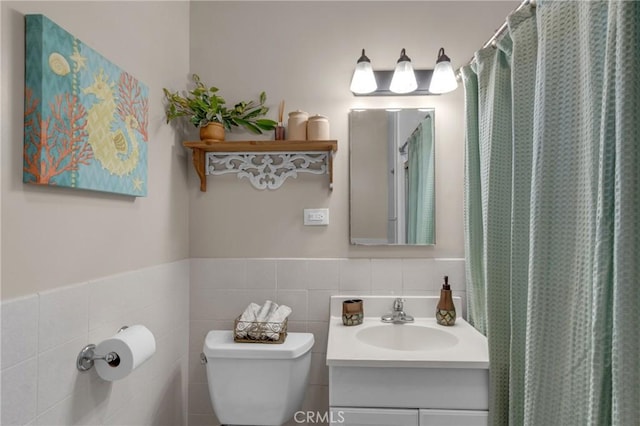 1269 W 1st St, San Pedro, CA 90732 - bathroom featuring vanity, tile walls, and a shower with shower curtain