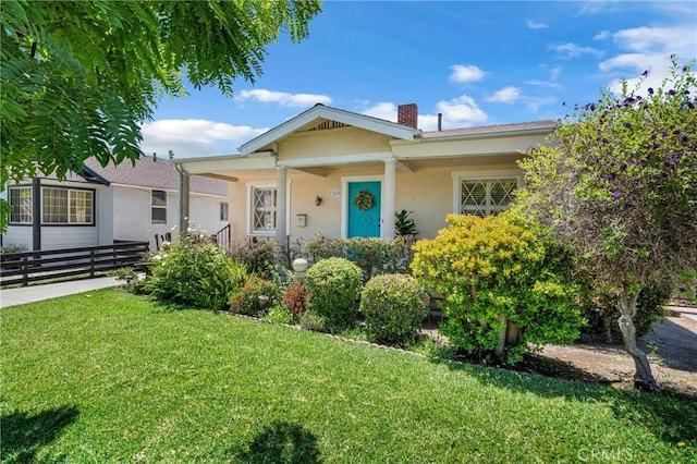 1269 W 1st St, San Pedro, CA 90732 - bungalow-style house with stucco siding and a chimney