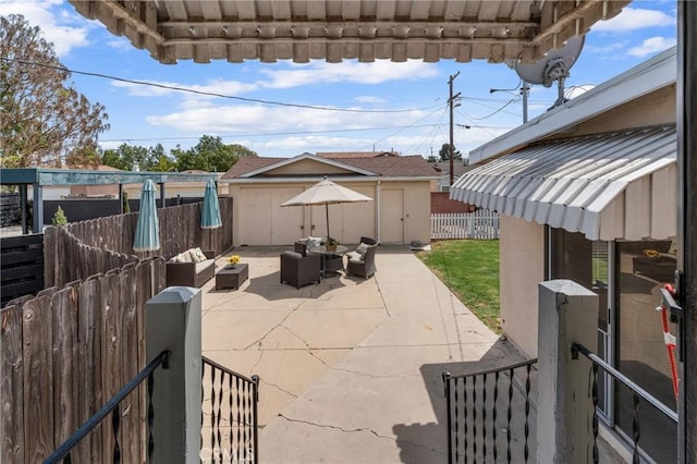 1269 W 1st St, San Pedro, CA 90732 - fenced backyard with an outbuilding, a patio, and outdoor lounge area