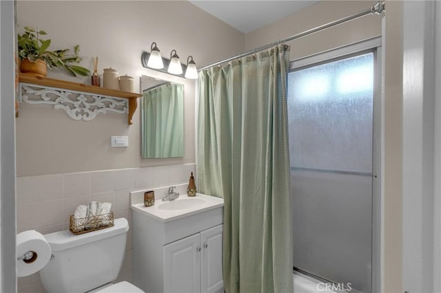 1269 W 1st St, San Pedro, CA 90732 - full bath with vanity, curtained shower, tile walls, and a wainscoted wall