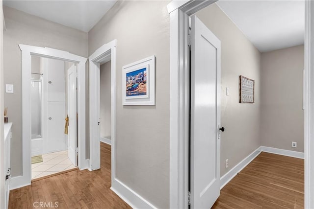 1269 W 1st St, San Pedro, CA 90732 - corridor featuring wood finished floors and baseboards