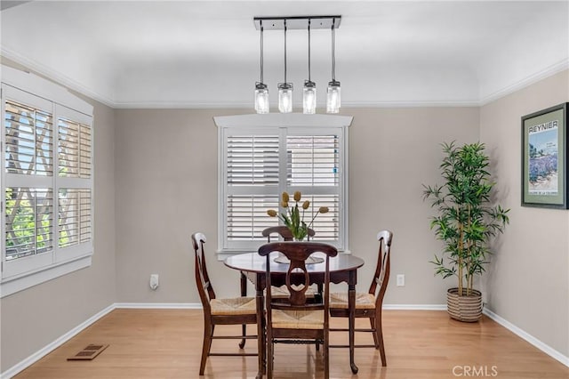 1269 W 1st St, San Pedro, CA 90732 - dining area featuring plenty of natural light, light wood-type flooring, and ornamental molding