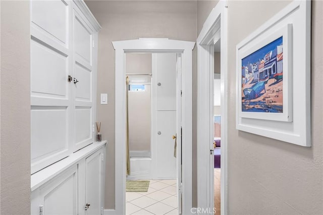 1269 W 1st St, San Pedro, CA 90732 - hallway with light tile patterned floors