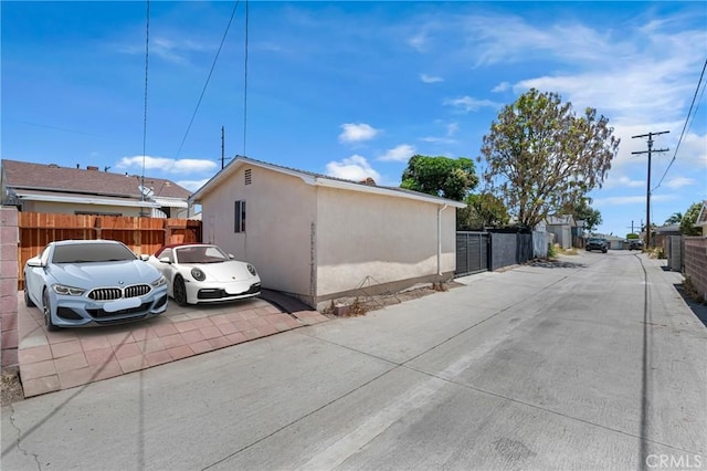 1269 W 1st St, San Pedro, CA 90732 - view of side of home with stucco siding