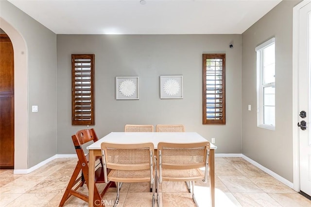 440 N Santa Maria St, Anaheim, CA 92801 - dining space with arched walkways and baseboards