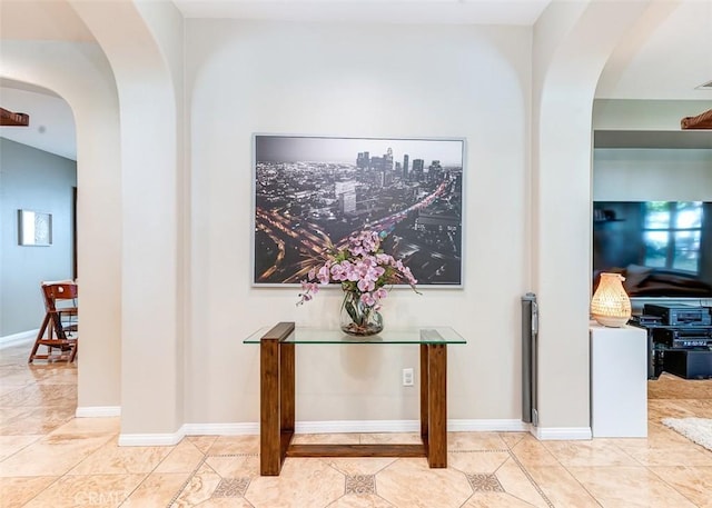 440 N Santa Maria St, Anaheim, CA 92801 - corridor featuring arched walkways and tile patterned flooring