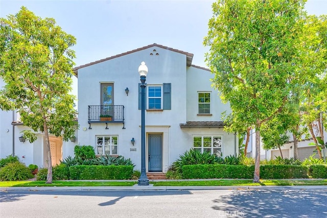 440 N Santa Maria St, Anaheim, CA 92801 - mediterranean / spanish-style house with a balcony and stucco siding