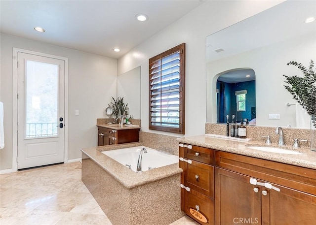 440 N Santa Maria St, Anaheim, CA 92801 - bathroom featuring vanity, a garden tub, and recessed lighting