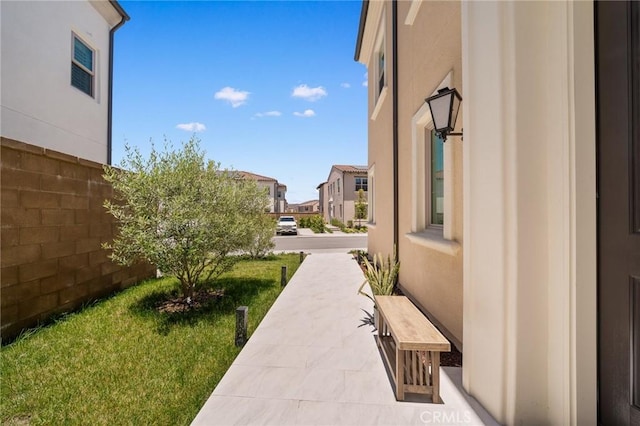 246 Canterbury, Irvine, CA 92618 - view of grassy yard featuring a residential view and a porch