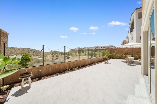 246 Canterbury, Irvine, CA 92618 - fenced backyard featuring a patio area and a mountain view