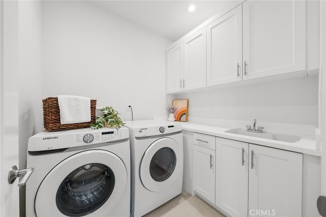 246 Canterbury, Irvine, CA 92618 - washroom with washing machine and dryer, cabinet space, and light tile patterned flooring