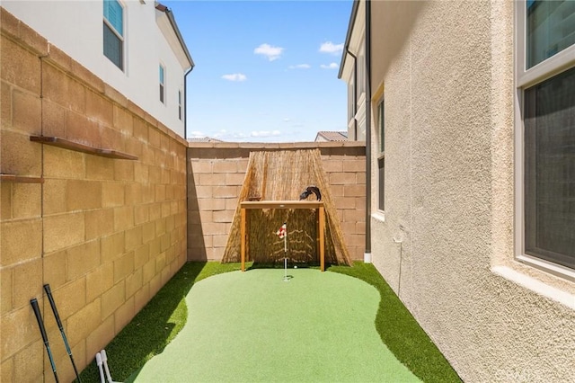 246 Canterbury, Irvine, CA 92618 - view of yard featuring a putting area