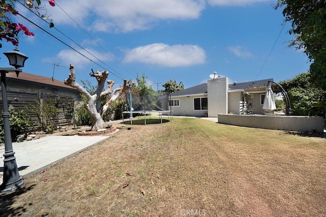 11302 Cheddar St, Norwalk, CA 90650 - view of yard with a trampoline and a patio area