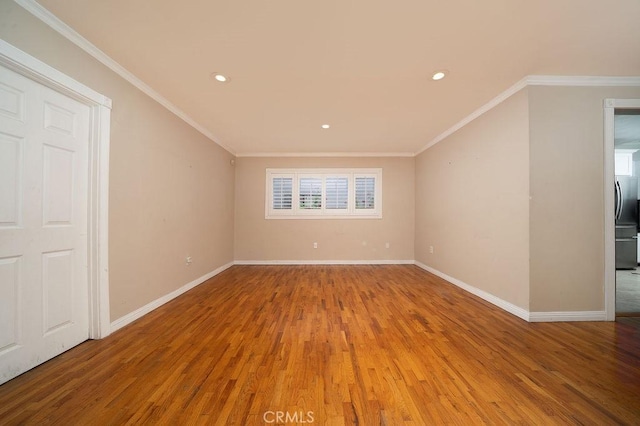 11302 Cheddar St, Norwalk, CA 90650 - spare room featuring wood finished floors, recessed lighting, and crown molding