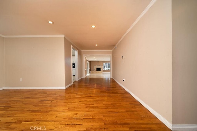 11302 Cheddar St, Norwalk, CA 90650 - hall with crown molding, wood finished floors, and recessed lighting