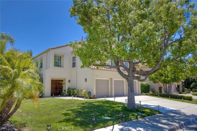32197 Callesito Fadrique, Temecula, CA 92592 - mediterranean / spanish home featuring concrete driveway, stucco siding, a front yard, a tiled roof, and a garage