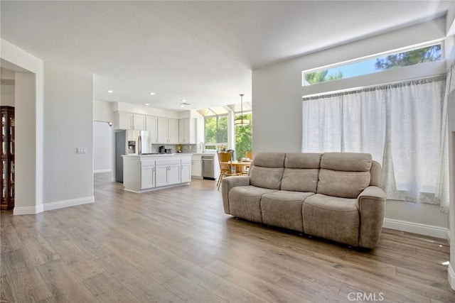 32197 Callesito Fadrique, Temecula, CA 92592 - living area featuring light wood-style floors and recessed lighting