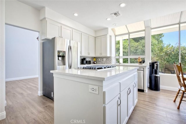 32197 Callesito Fadrique, Temecula, CA 92592 - kitchen with appliances with stainless steel finishes, plenty of natural light, light wood-type flooring, and recessed lighting