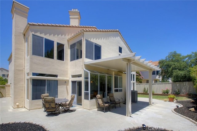 32197 Callesito Fadrique, Temecula, CA 92592 - back of property with a chimney, stucco siding, and a patio