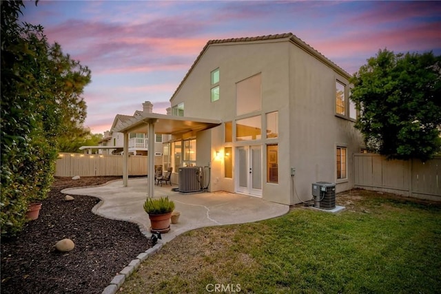 32197 Callesito Fadrique, Temecula, CA 92592 - rear view of property with a fenced backyard, a patio area, stucco siding, and french doors