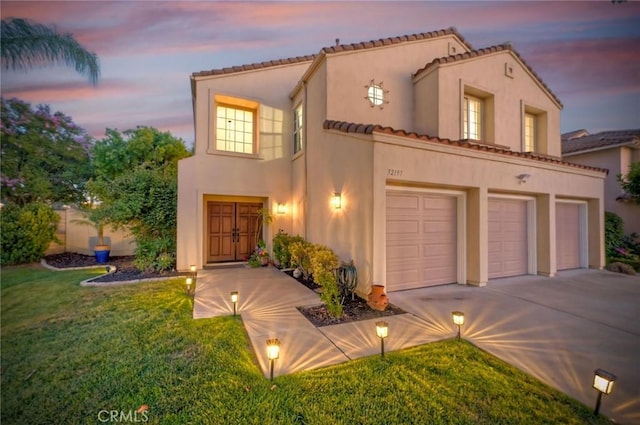 32197 Callesito Fadrique, Temecula, CA 92592 - mediterranean / spanish-style home featuring driveway, stucco siding, a garage, a lawn, and a tile roof