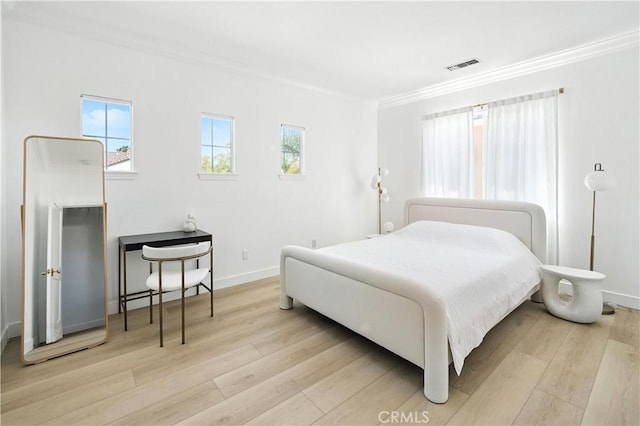 29125 Starwood Pl, Saugus, CA 91390 - bedroom with crown molding and light wood-style floors