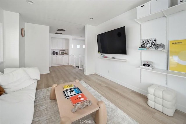 29125 Starwood Pl, Saugus, CA 91390 - living room with light wood finished floors and baseboards