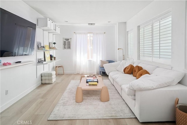29125 Starwood Pl, Saugus, CA 91390 - living area with light wood-type flooring and baseboards