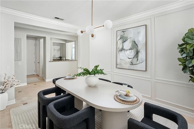 29125 Starwood Pl, Saugus, CA 91390 - dining area featuring crown molding and a decorative wall