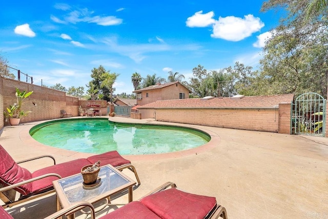 1153 Merritt Dr, El Cajon, CA 92020 - view of swimming pool featuring a fenced backyard and a patio area