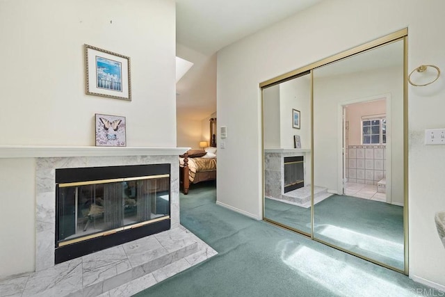 1153 Merritt Dr, El Cajon, CA 92020 - unfurnished living room with a glass covered fireplace and carpet flooring