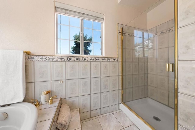 1153 Merritt Dr, El Cajon, CA 92020 - bathroom featuring tile walls, a stall shower, tile patterned floors, and a tub to relax in