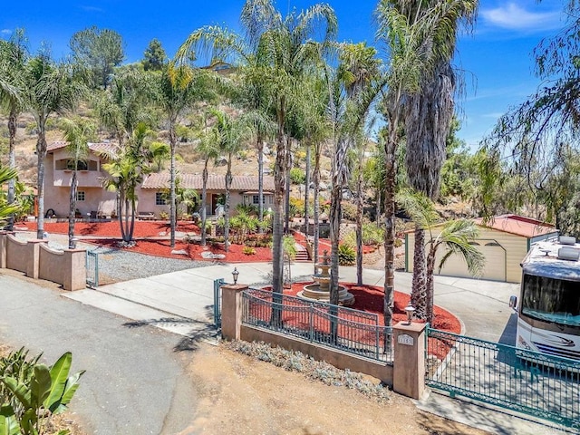 1153 Merritt Dr, El Cajon, CA 92020 - view of home's community with concrete driveway and a garage