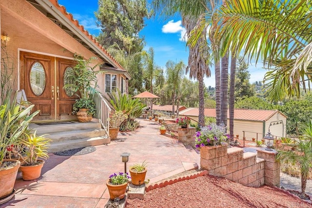 1153 Merritt Dr, El Cajon, CA 92020 - view of patio with an outdoor structure