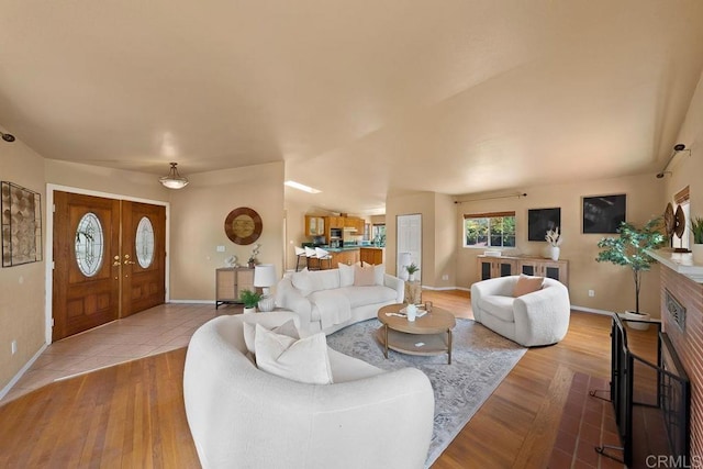 1153 Merritt Dr, El Cajon, CA 92020 - living area with baseboards and wood finished floors