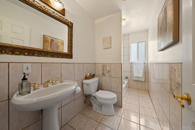 1153 Merritt Dr, El Cajon, CA 92020 - full bathroom featuring tile walls, wainscoting, and tile patterned flooring