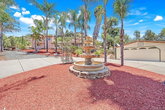 1153 Merritt Dr, El Cajon, CA 92020 - view of yard with a garage and concrete driveway