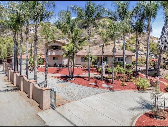 1153 Merritt Dr, El Cajon, CA 92020 - view of community with a gate and a fenced front yard