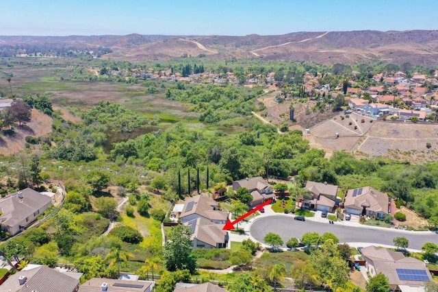 888 Arvita Ct, Oceanside, CA 92057 - aerial view of property's location featuring nearby suburban area and a mountain backdrop
