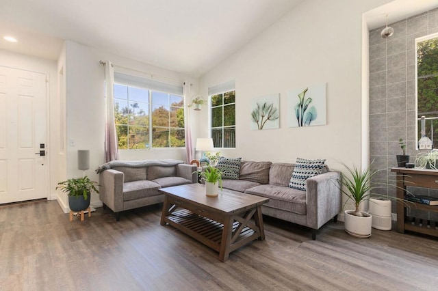 888 Arvita Ct, Oceanside, CA 92057 - living room with wood finished floors, lofted ceiling, and recessed lighting