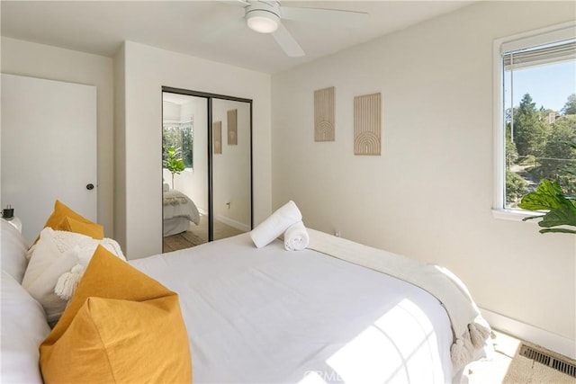 915 Breithorn Dr, Lake Arrowhead, CA 92352 - bedroom with multiple windows, a closet, and ceiling fan